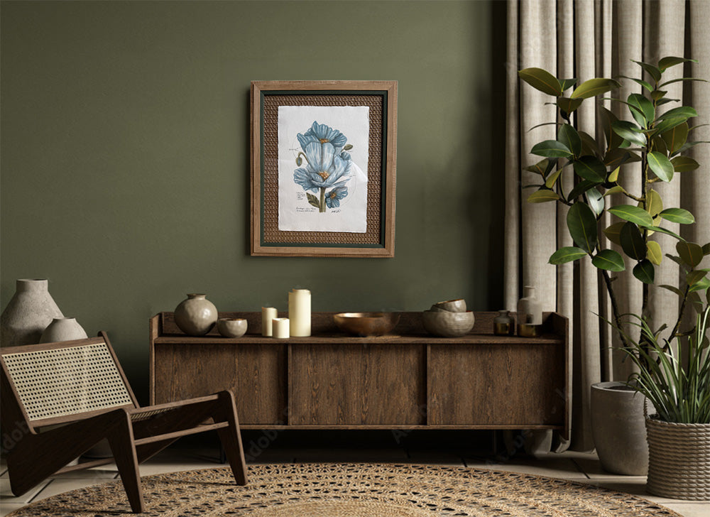 Living room with wooden cabinet, chair, and decorative items against a green wall.